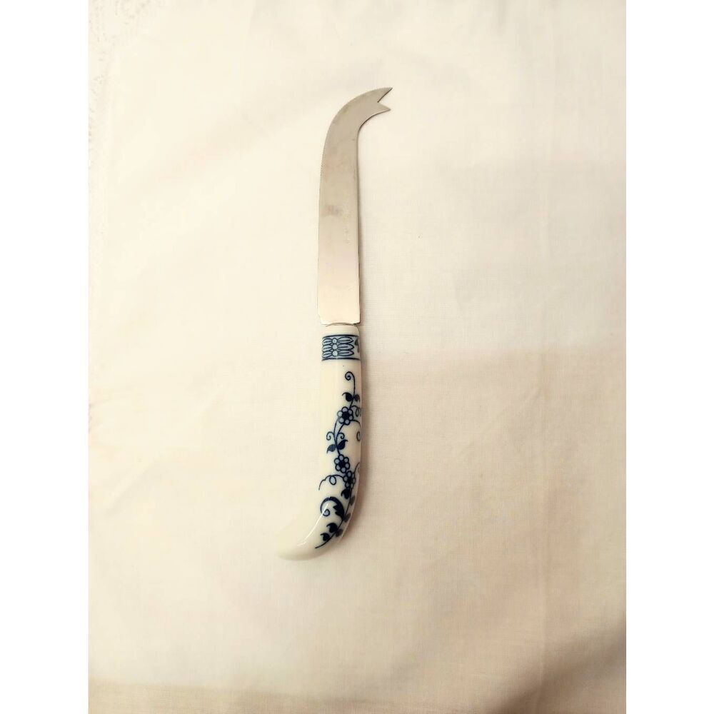Vintage Lord & Taylor flatware piece ceramic handled cheese knife. Blue and whit
